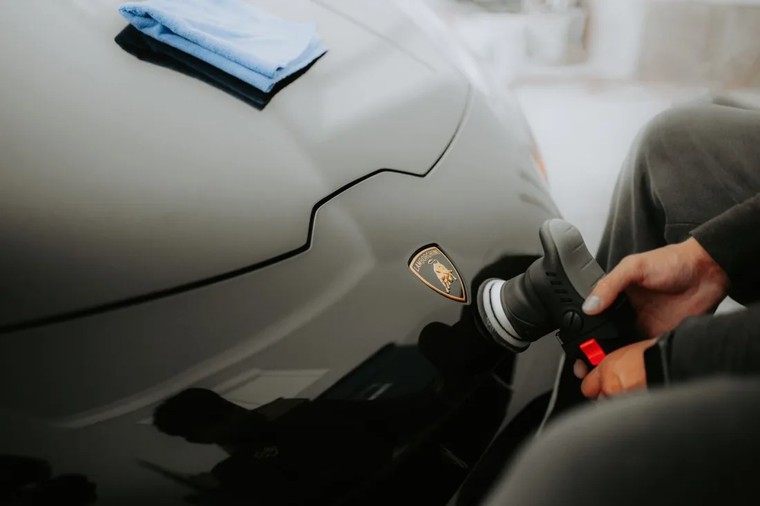 Polishing and coating a car hood to a deep gloss